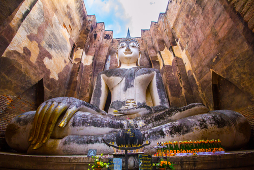 Buddha Sculpture in a temple in Sukhothai Historical Park south of Chiang Mai, Thailand