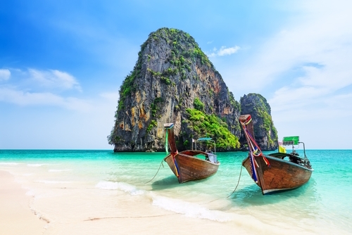 Thai traditional wooden longtail boat and beautiful sand Ao Phra Nang Beach in Krabi province, Ao Nang, Thailand
