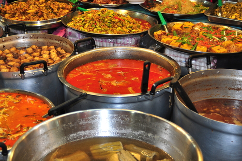 Many delicious prepared Thai foods are sold at the daily Or Tor Kor Fresh Food Market in Bangkok, Thailand