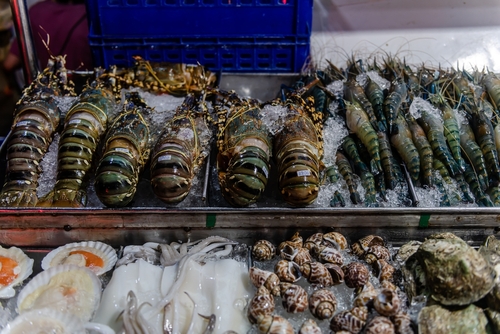 Varieties of fresh food like big prawns, lobsters and others selling in the market at Chatuchak Park known as Aor Tor Kor, Bangkok, Thailand