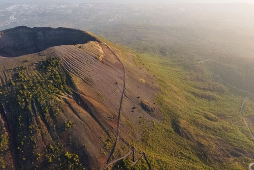 An Aerial view of Mount Vesuvius crater at sunset, a volcano in Naples, Campania, Italy