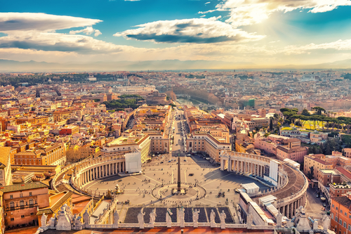 Saint Peter's Square in Vatican and aerial view of Rome, Italy