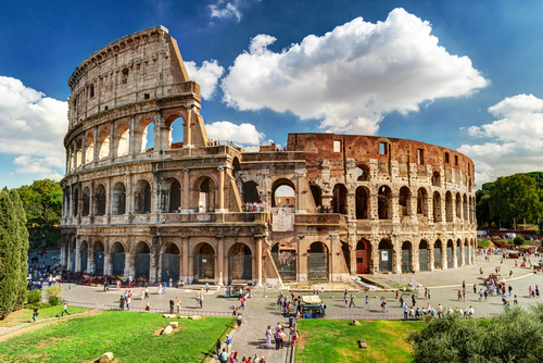 Colosseum in Rome, Italy. Ancient Roman Colosseum is one of main tourist attractions in Europe. People visit famous Colosseum in Roma city center. Scenic nice view, photo of Colosseum ruins in summer