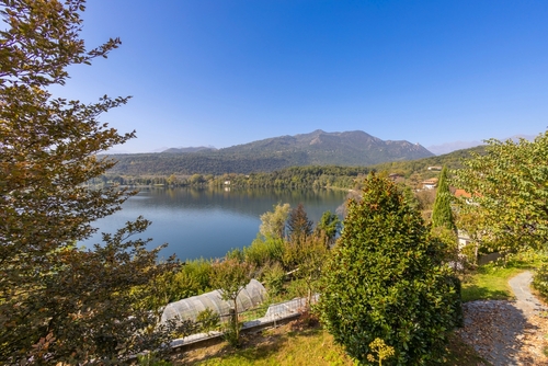 View of the big lake of Avigliana (Lago Grande), in the province of Turin, Piedmont, Italy