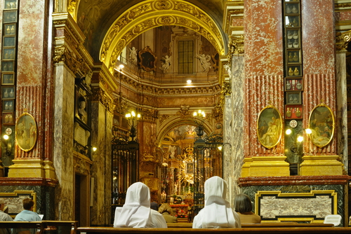 Golden interior of Santuario della Consolata Baroque church in Turin, Piedmont, Italy. This church was built in 17 and 18 centuries on place of 5th century church