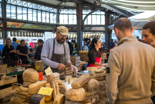 People at the local traditional market at Porta Palazzo in Turin, Piedmont, Italy