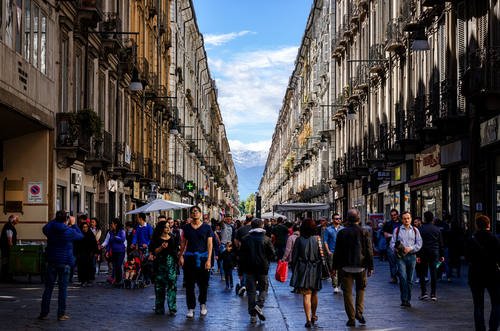 Via Garibaldi, main shopping street of Turin, Piedmont, Italy. Crowded with tourists on a spring sunday