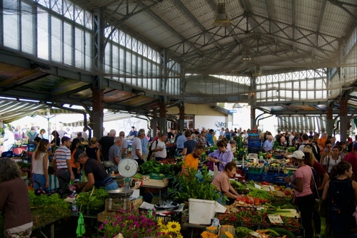 Fruit and vegetables on offer in the famous Mercato Porta Palazzo market hall in the historic centre of Turin, Piedmont, Northern Italy