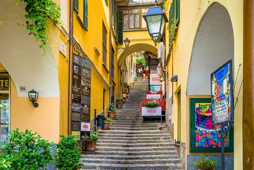 Town of Bellagio on Lake Como, Lombardy, Italy. Alley and stores, the town is famous for popular luxury resort, coast and lakefront