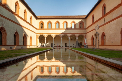 Interior courtyard of the Sforza Castle (Castello Sforzesco) in Milan, Lombardy, Italy, one of the largest citadels in Europe