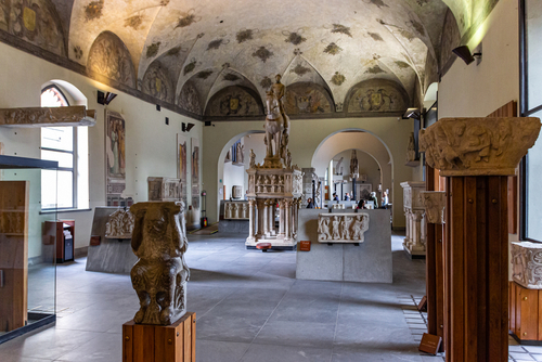 The hall with funerary sarcophagus and other funerary excavations at the exhibit in the museum of the Sforzesco Castle, Castello Sforzesco in Milan, Lombardy, Italy
