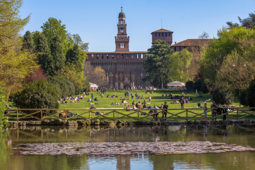 People enjoying a nice day at the Parco Sempione (Sempione Park), Northwest Milan, Italy