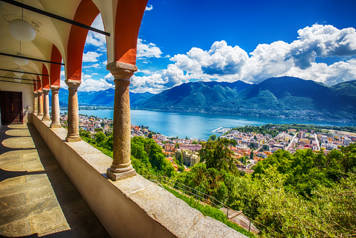 Beautiful view to Locarno city, lake Maggiore (Lago Maggiore) and Swiss Alps from Madonna del Sasso Church in Ticino, Switzerland
