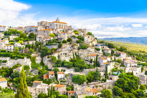View of Gordes, a small medieval town in Provence, France. A view of the ledges of the roof of this beautiful village and landscape