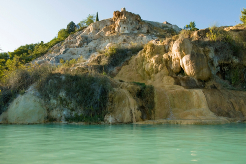 View of the Bagno Vignoni hot spring of thermal water baths in Val d'Orcia, Tuscany, Italy