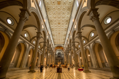 Interior looking towards the balcony of The Basilica di San Lorenzo (Basilica of Saint Lawrence) in Florence, Tuscany, Italy