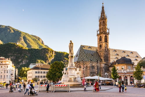 Tourists at Walther Square in Bolzano, Trentino-Alto-Adige region, Italy. Bolzano is the largest city of South Tyrol