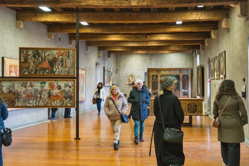 Castelvecchio museum. Decorate walls of the Scaliger castle with visitors and artwork in Verona, Veneto, Italy
