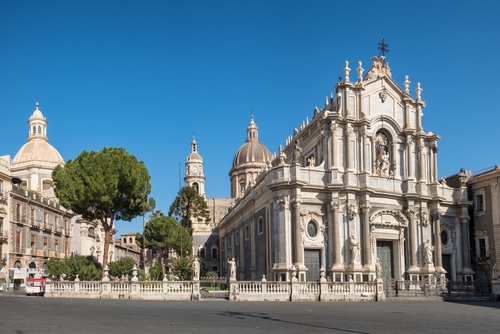 Panorama of the empty Piazza del Duomo square with Saint Agata Cathedral in Catania, Sicily, Italy