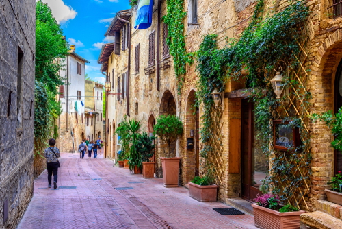 Old street in San Gimignano, a typical Tuscan medieval town in Tuscany, Italy