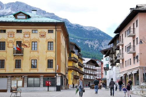 View of people walking down a street in the town of Cortina d'Ampezzo, Trentino Alto Adige, Italy