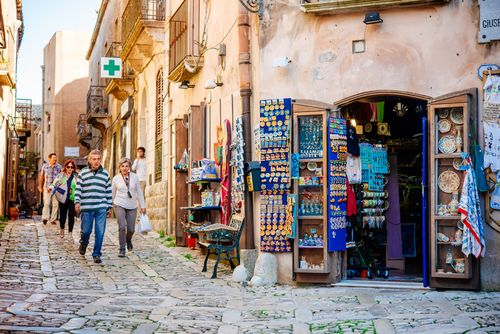 People walk in the historical centre of Erice, Trapani, Sicily, Italy