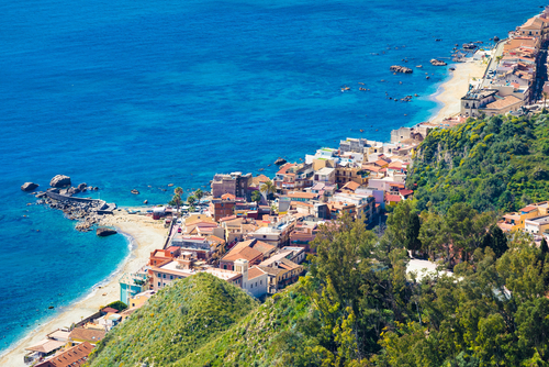 Aerial view of Giardini Naxos, comune in Messina on Sicily Island, Italy. It is situated on coast of Ionian Sea between Cape Taormina and Cape Schiso