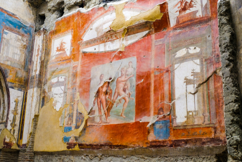 Herculaneum, ancient roman town, wall in hall of College of the Augustans with Neptune and Aimone fresco, Archeological site near Naples, Campania, Italy