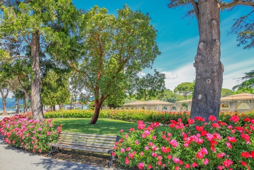 Idyllic and colorful public park at Springtime in Lazise, Lake Garda, Veneto, Italy