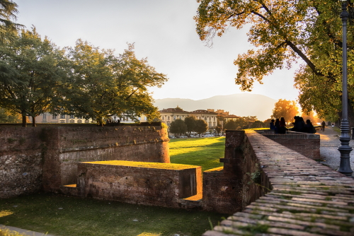 Evening at Medieval fortress wall part of the city walls of Lucca, Tuscany, Italy