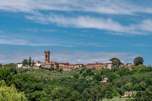 View of the ancient Tuscan village of Montecarlo di Lucca, Tuscany, Italy, under a beautiful sky