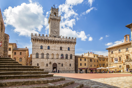 View of the Palazzo Comunale (Town Hall) in Piazza Grande at the medieval village of Montepulciano, Val d'Orcia, Tuscany, Italy