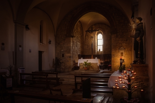 Interior of the church of Saint Mary (Santa Maria), Monteriggioni, Tuscany, Italy