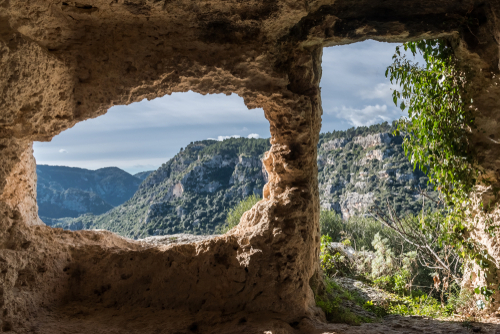 Interior of a prehistoric tomb in the Unesco site of Pantalica, Anapo valley, Sicily, Italy