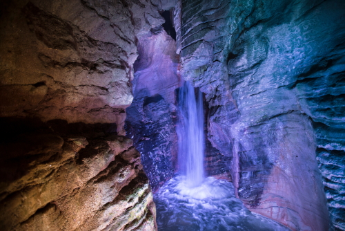 View of a waterfall inside the Parco Grotta Cascata Varone, near La Garda Lake, Trentino Alto Adige, Italy
