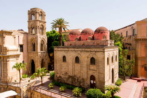 Exterior view of San Cataldo church and its three red domes on Bellini Square in Palermo, Sicily, Italy