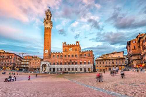 View of Piazza del Campo with people in Siena, Tuscany, Italy