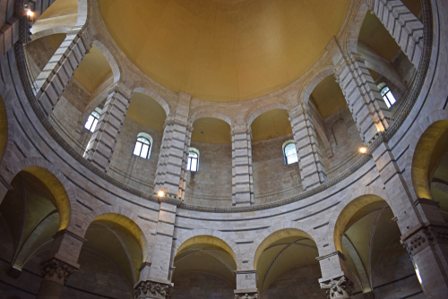 Interior view Pisa Baptistery of St. John (Battistero di San Giovanni di Pisa) in Pisa, Tuscany, Italy. Pisa Baptistery became the second building, in chronological order, in Piazza dei Miracoli, near Duomo di Pisa