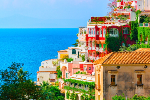 View of colorful villas looking out to the beautiful sea in Positano, Amalfi Coast, Campania, Italy