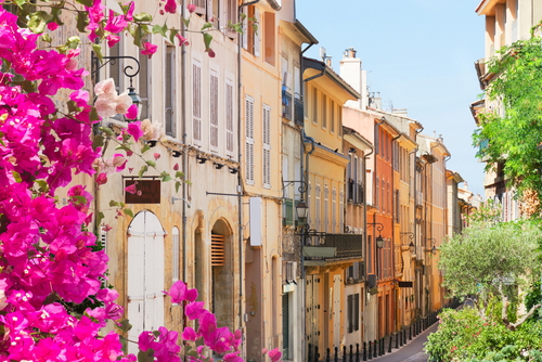 Old town street with flowers of Aix en Provence, France