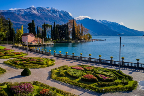 Beautiful garden view at the waterfront town of Riva del Garda, located in La Garda Lake, Trentino Alto Adige, Italy