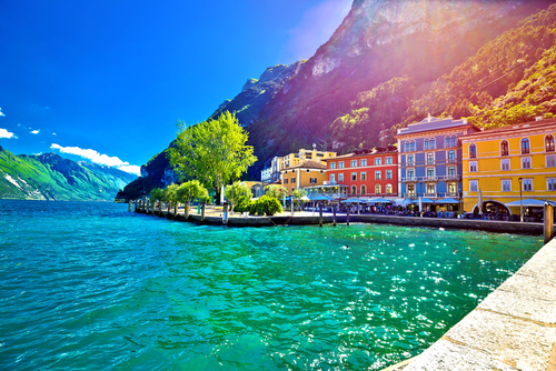 Beautiful view of La Garda lake and colorful buildings in the town of Riva del Garda, located in La Garda Lake, Trentino Alto Adige, Italy