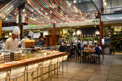 Counter of Luciano Savini Tartufi, offering dishes and specialties based on Tuscan truffles, inside the Central Market of San Lorenzo district in Florence, Tuscany, Italy