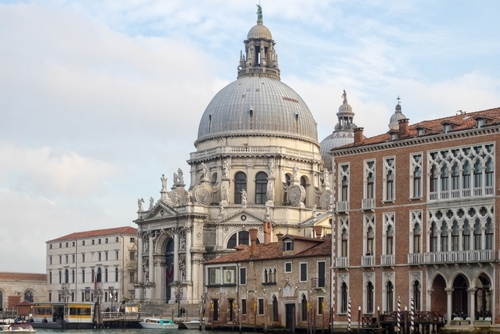 Exterior view of the Basilica of Saint Mary of Health (Basilica di Santa Maria della Salute) from the Santa Maria del Giglio gondola station, Venice, Veneto, Italy