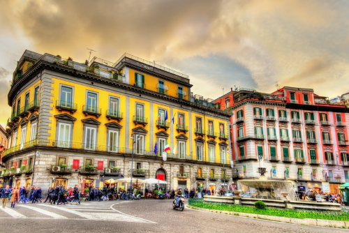 People walking and shopping at Piazza Trieste e Trento in Naples, Campania, Italy