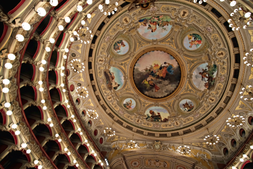 Interior view of the ceiling decorations of Teatro Massimo dedicated to Vincenzo Bellini in Catania, Sicily, Italy