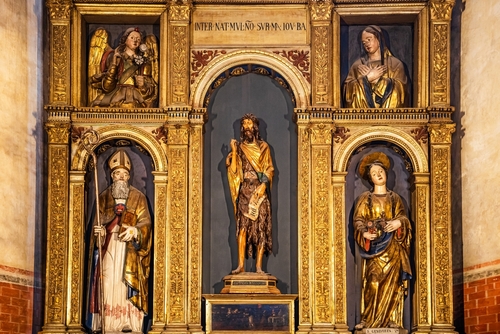 Wooden statue of St. John the Baptist by Donatello from 1438 inside the Basilica Santa Maria Gloriosa dei Frari in Venice, Veneto, Italy