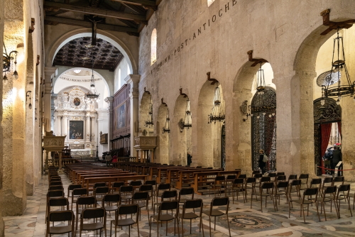 Main nave and presbytery of Nativity of Holy Mary Cathedral at Piazza Duomo square on Ortygia island in Syracuse, Sicily, Italy