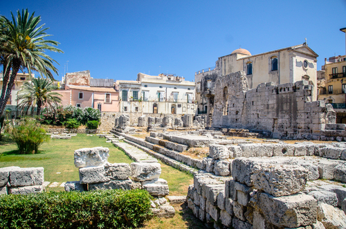 Ruins of the temple of Apollo, an important Greek ancient monument, on the island of Ortygia, Syracuse, Sicily, Italy