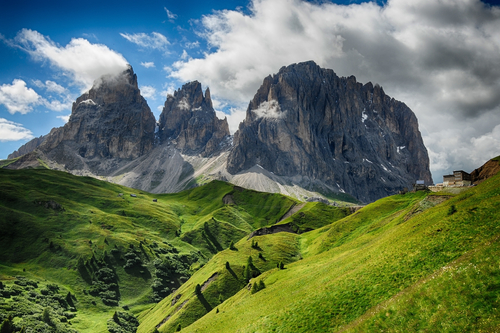 Sassolungo & Sassopiatto mountain ranges as seen from Passo Sella on a cloudy afternoon, Dolomites mountains, Trentino Alto Adige, Italy